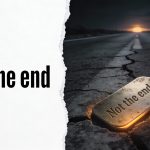 Is relapse the end? Dark cracked road leading toward a faint sunrise, with a worn metal tag engraved ‘Not the end.